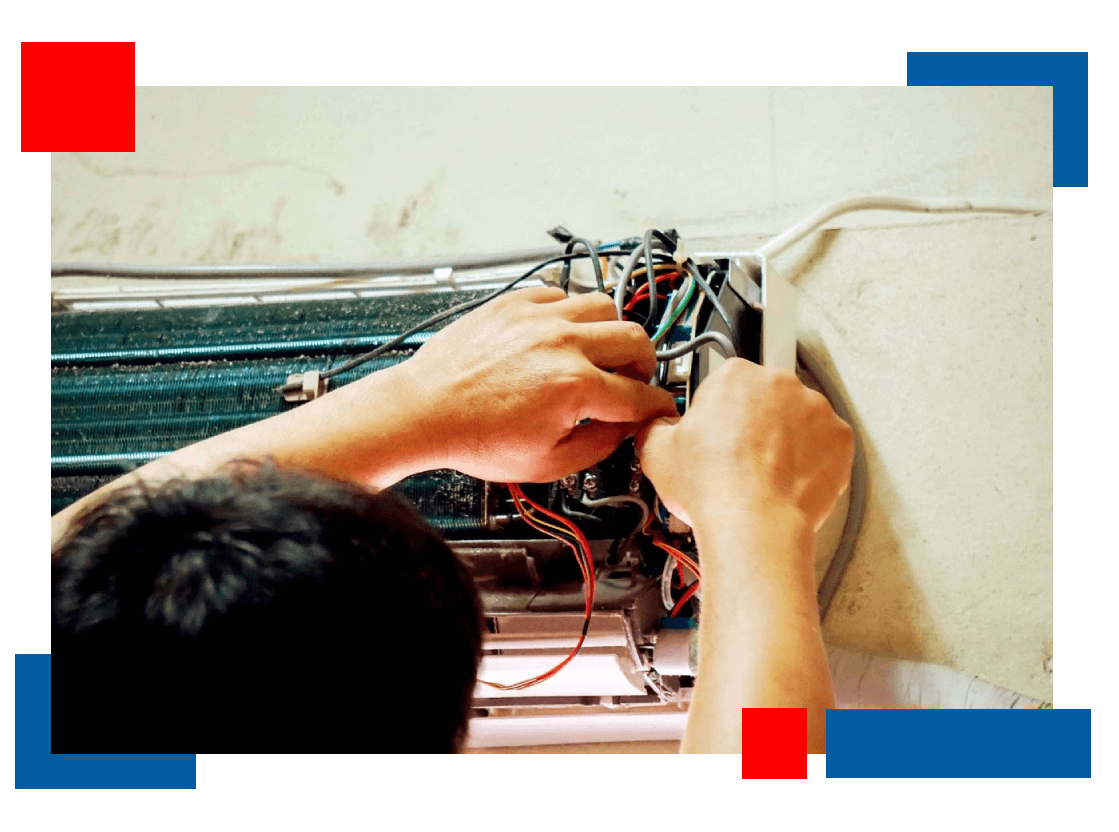 On Point technician repairing an air conditioner unit